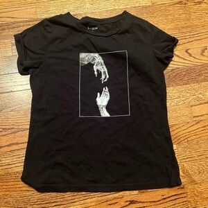 Black T-shirt with creation hands